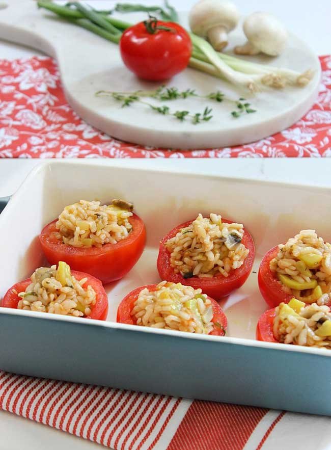 6 Risotto Stuffed Tomatoes in a baking dish