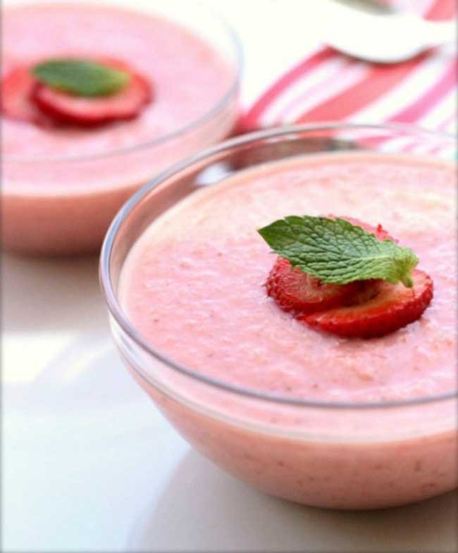 two bowls of strawberry soup recipe with strawberry in the middle of the soup