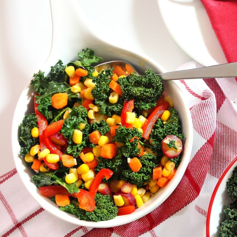 Spicy, Garlic-Braised Kale, Carrot and Corn Medley in a large bowl