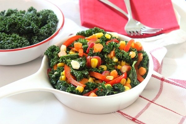 Spicy, Garlic-Braised Kale, Carrot and Corn Medley in a large bowl
